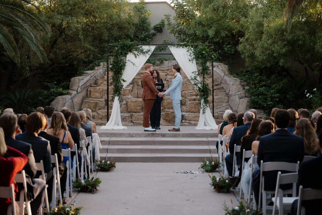 Joey and Jack celebrating their wedding day at DragonRidge Country Club in Las Vegas